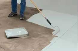 Worker Painting Floor