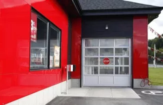 Garage door for a car wash